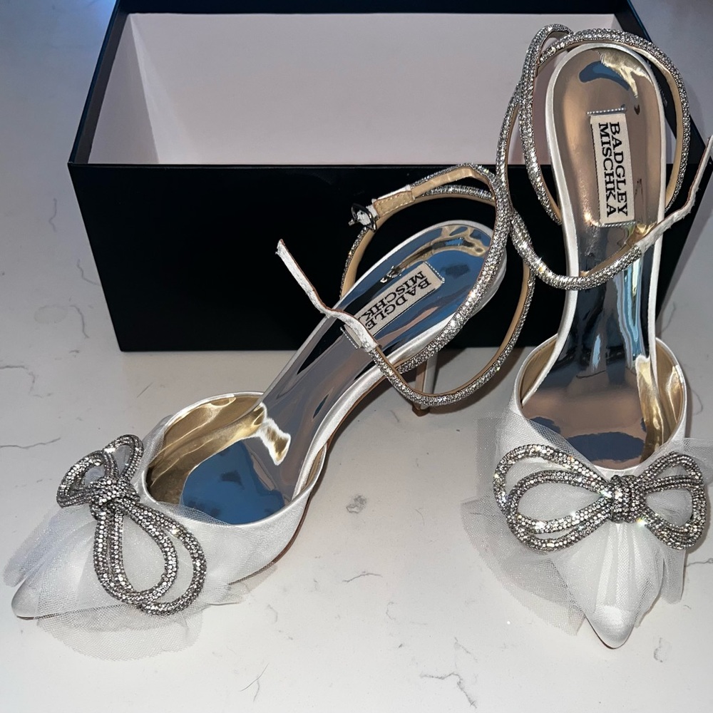 Badgley Mishka- Glamorous, rhinestone embellished heel with ribbon bow at toe.